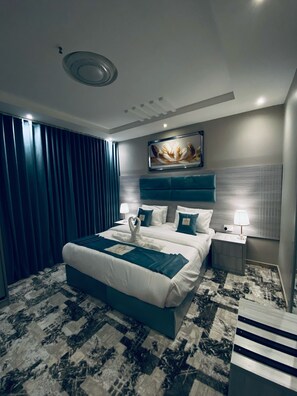 Deluxe Double Room, Courtyard View | Desk, laptop workspace, soundproofing, iron/ironing board - zahrat alrabie lilshuqaq almakhduma (Jeddah)