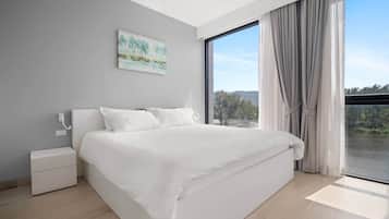 Apartment, 2 Bedrooms, Partial Lake View | 2 bedrooms, in-room safe, desk, iron/ironing board