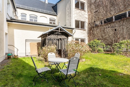 Outdoor dining. Holiday Apartment in the Former Manor 'Bergblick' with Garden and Wi-Fi