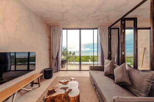 Suite, Sea View | Living area | TV