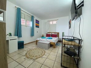 1 bedroom, desk, iron/ironing board, travel crib