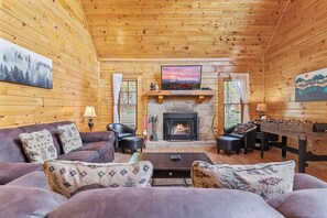 Signature Cabin, 2 Bedrooms, Non Smoking, Hot Tub | Living room | 55-inch Smart TV with digital channels, fireplace - Serene Creek Cabin (Sevierville)