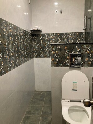 Shower, towels, soap, shampoo