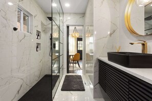 Shower, hair dryer, towels