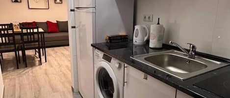 Fridge, microwave, stovetop, coffee/tea maker