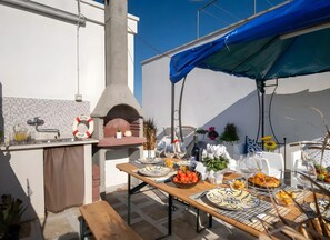 Apartment, 1 Bedroom, Smoking | Outdoor dining - Azure Retreat in Porto Cesareo (Porto Cesareo)