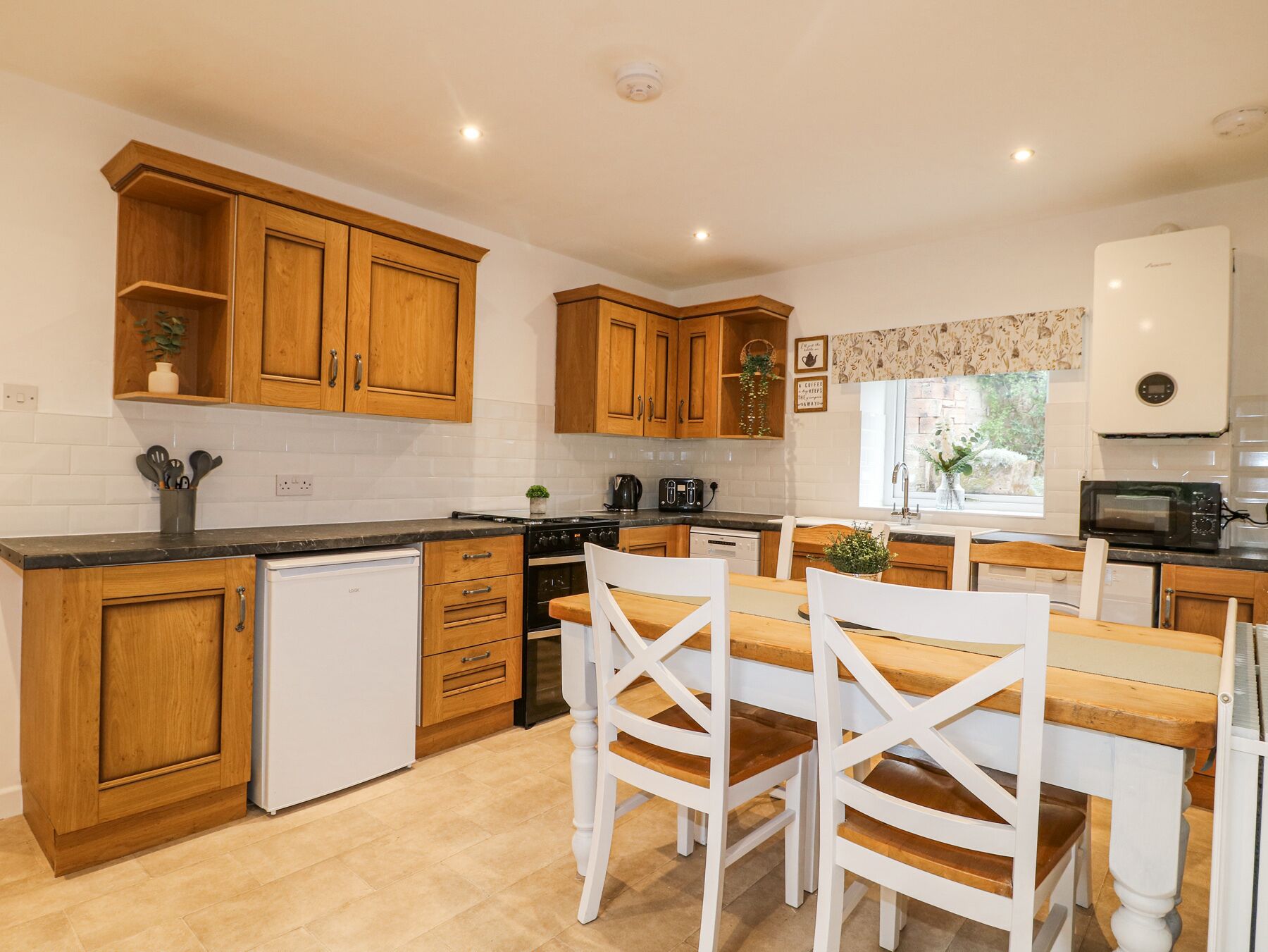Fridge, microwave, dishwasher, cookware/dishes/utensils