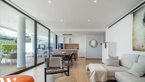 A modern interior with a dining area, kitchen, and seating space. - Garden Villa - Large Terrace with Outdoor Kitchen and Pool, Higueron West, Fuengirola (Fuengirola)