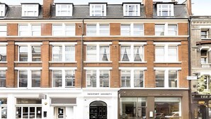 A multi-story building with a ground-floor restaurant named "Olde English Pub" and a "Newport House" above it. - Prime West End Flat – Walk to Everything! (Greater London)