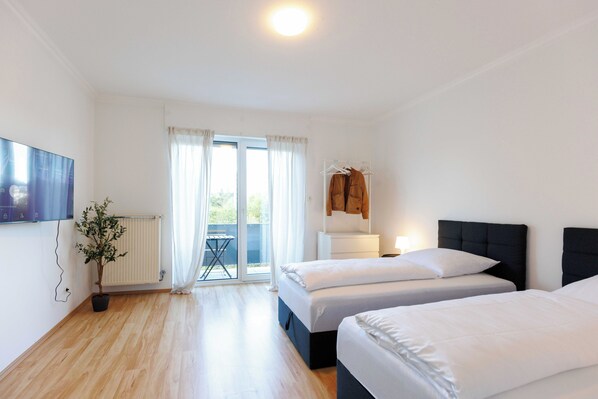 Appartement, 2 slaapkamers, balkon | Een strijkplank/strijkijzer, gratis wifi