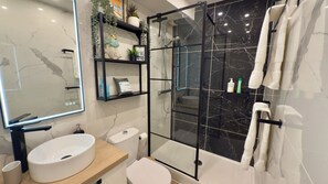 Hair dryer, towels, soap, toilet paper