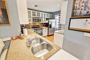 Condo, 2 Bedrooms | Private kitchen | Fridge, oven, coffee/tea maker, toaster
