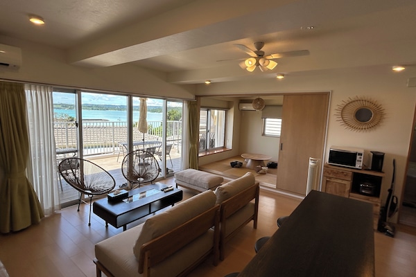 3 bedroom 3LDK, with ocean view (No Pets allowed) | Living area | Flat-screen TV