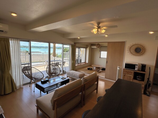 3 bedroom 3LDK, with ocean view (No Pets allowed) | Living area | Flat-screen TV - Four Season Resort Kouri (Nakijin)