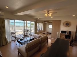 3 bedroom 3LDK, with ocean view (No Pets allowed) | Living area | Flat-screen TV