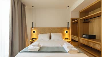 Superior Studio, Pool View | In-room safe, blackout drapes, soundproofing, iron/ironing board