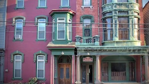 A red brick building with green trim and multiple windows. - Shamokin Bed and Breakfast (Shamokin)