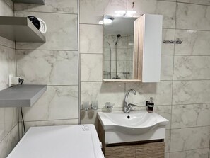 Hair dryer, towels, soap, toilet paper