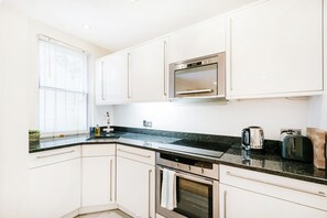 Apartment | Private kitchen | Fridge, microwave, oven, stovetop