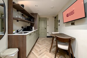 Fridge, microwave, coffee/tea maker, toaster