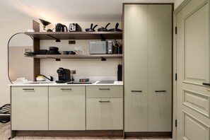 Fridge, microwave, coffee/tea maker, toaster