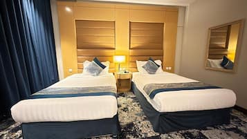 Chambre Double Deluxe | Draps en coton égyptien, literie de qualité supérieure