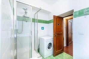 Hair dryer, bidet, towels, soap