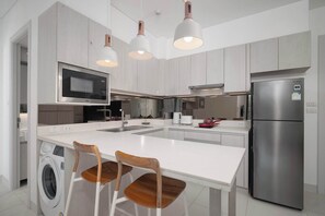 Fridge, microwave, stovetop, electric kettle