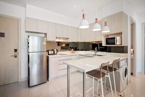 Fridge, microwave, toaster, cookware/dishes/utensils