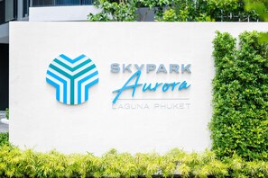 A sign for Skypark Aurora in Laguna Phuket with a logo and text.