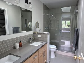 Shower, towels, soap, toilet paper