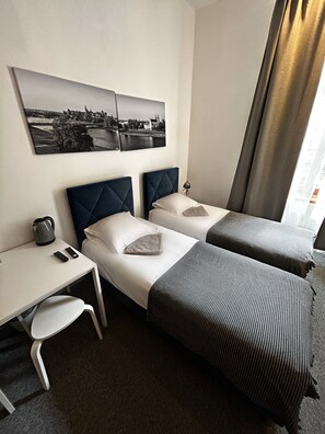 Superior Triple Room, City View | Iron/ironing board, free WiFi