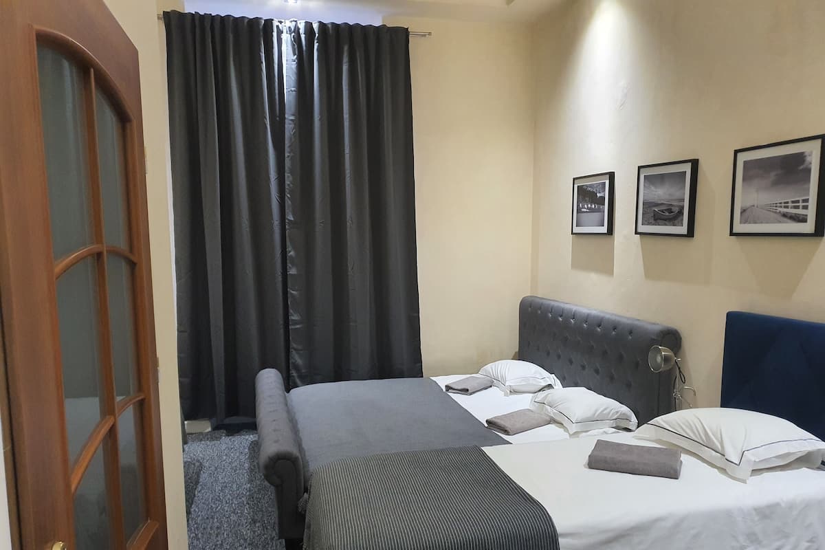 Superior Quadruple Room, City View