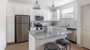 Fridge, microwave, oven, stovetop - Landing | Chic 2BD, Pool, Gym (Fort Worth)