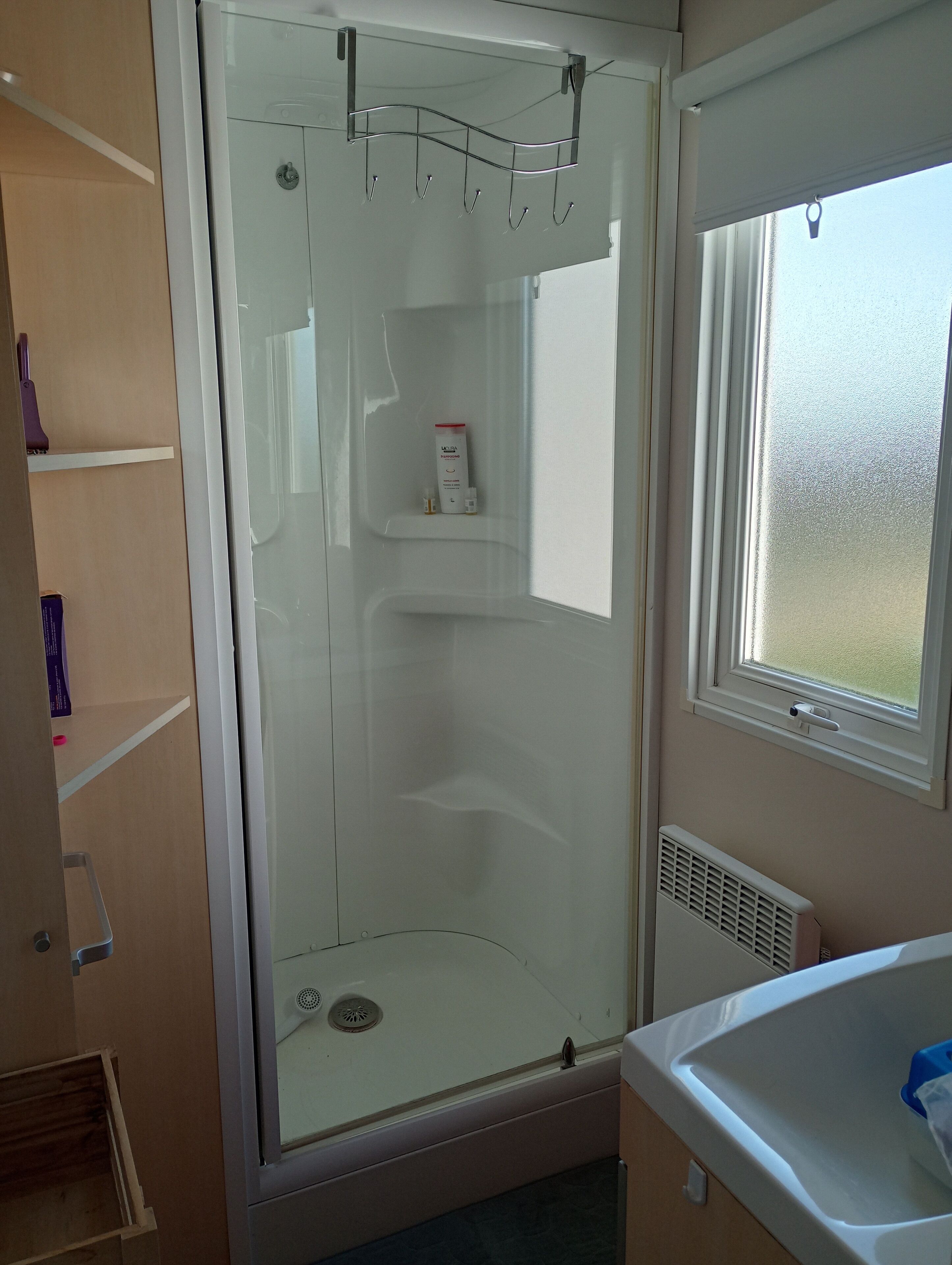 Shower, towels, toilet paper