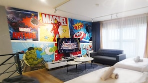 Family Apartment, 2 Bedrooms | Living area | 55-inch LED TV with digital channels