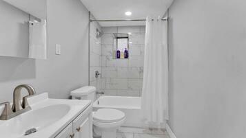 Shower, hair dryer, shampoo