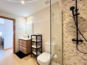 Shower, hair dryer, towels