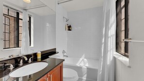 Shower, hair dryer, shampoo