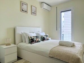 2 dormitorios, tabla de planchar con plancha, wifi gratis y ropa de cama