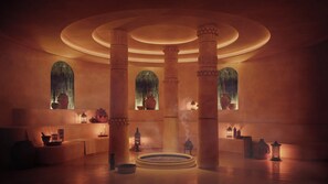A spacious interior with high ceilings, large columns, and arched windows. - Nômade Temple Madrid (Madrid)