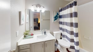 Hair dryer, towels, soap, shampoo