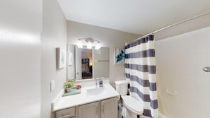 Hair dryer, towels, soap, shampoo