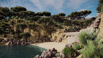 Ubicación a pie de playa, arena blanca, tumbonas y sombrillas