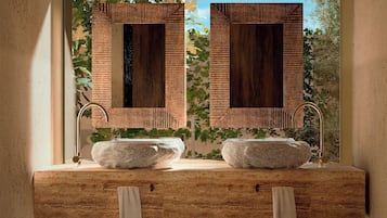 Separate bathtub and shower, hair dryer, bathrobes, slippers