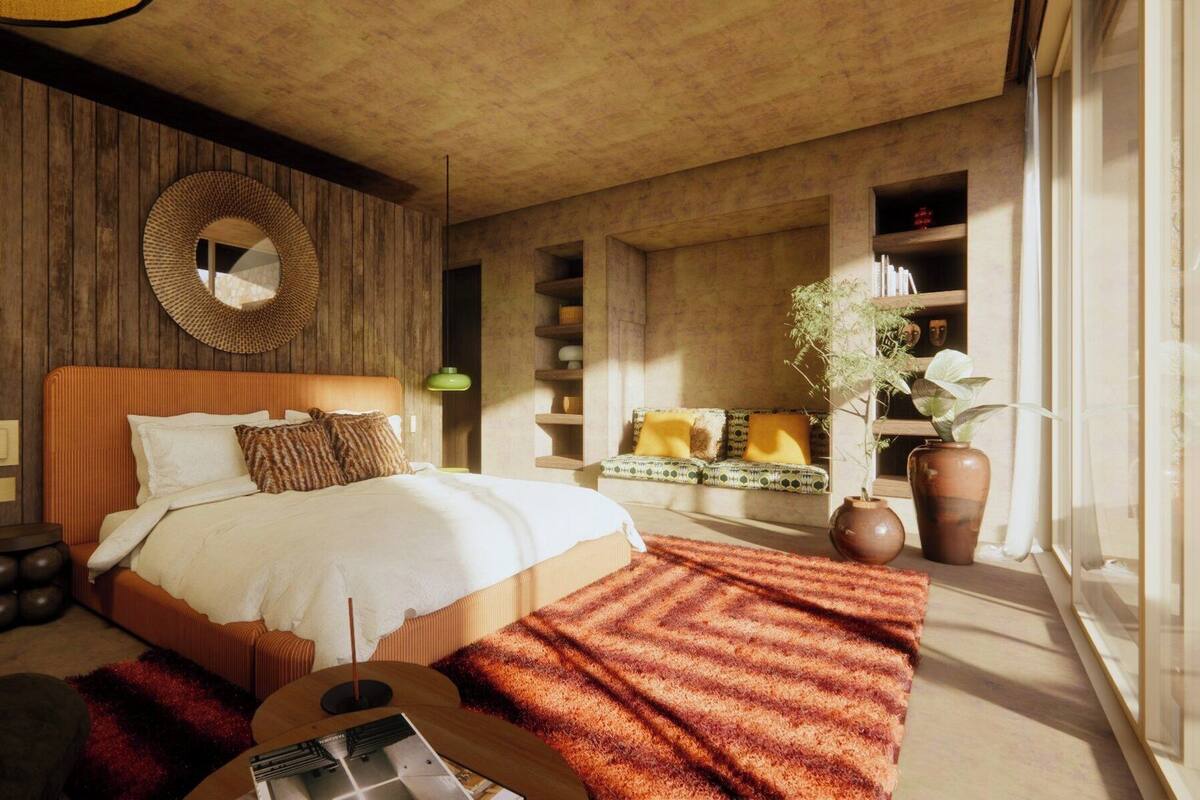 A bedroom with a bed, a guitar, a mirror, and a plant.