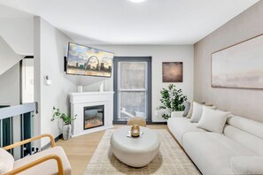 Smart TV, fireplace, books