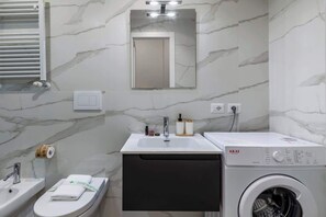 Shower, hair dryer, shampoo