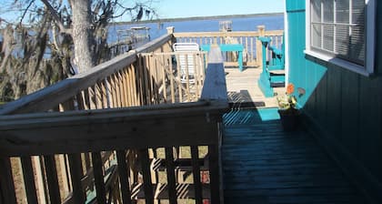 Discover the perfect escape at this peaceful 2-bedroom, 1-bath home on the water