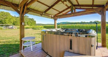Hot Tub & Creek Views: Secluded Perryville Cabin
